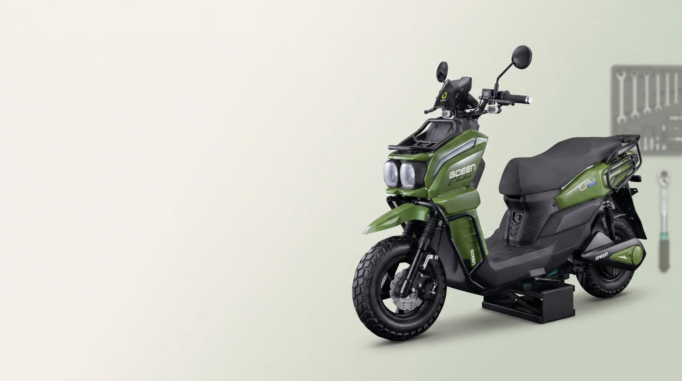 A GOEEN technician servicing a scooter
